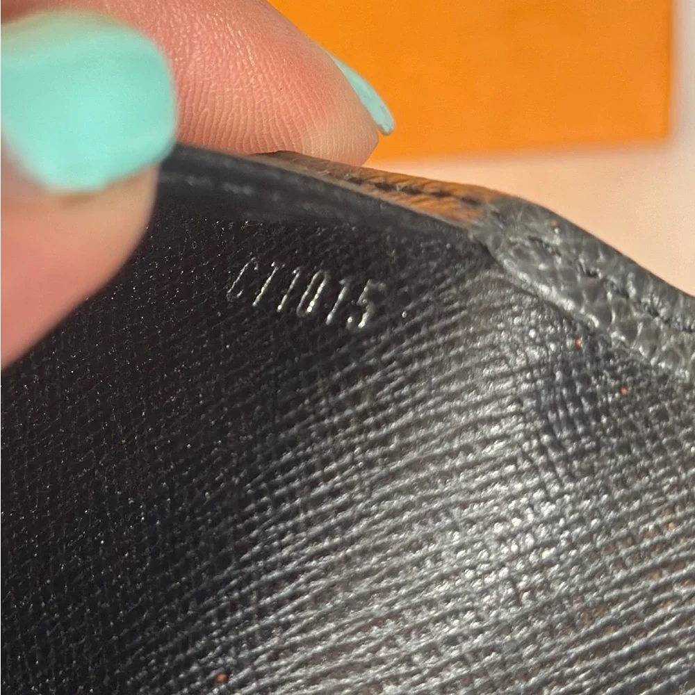 Authentic Louis Vuitton Black Brazza Taiga Long Bifold Wallet
